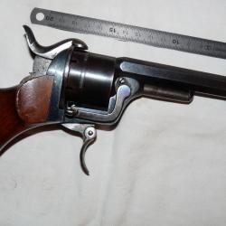Revolver a broche à cadre ouvert système Loron calibre 9mm