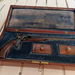 Pistolet de tir Flobert en coffret environ 1895