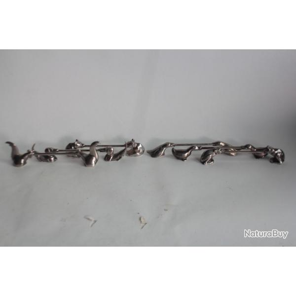 Six porte-couteaux animaux mtal argent Art Dco