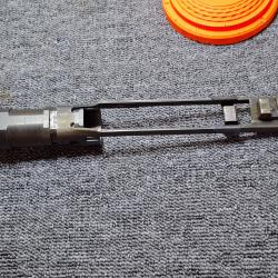 REMINGTON 1100 - Cal12 - Pièce  - Bras de commande