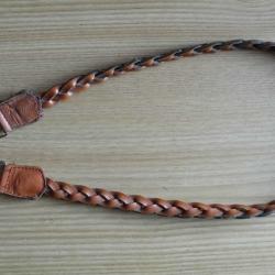 Bretelle carabine en cuir tressé