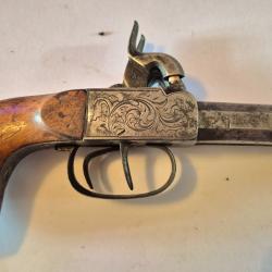 Pistolet a coffre 2 coups bon état de fonctionnement et de présentation.