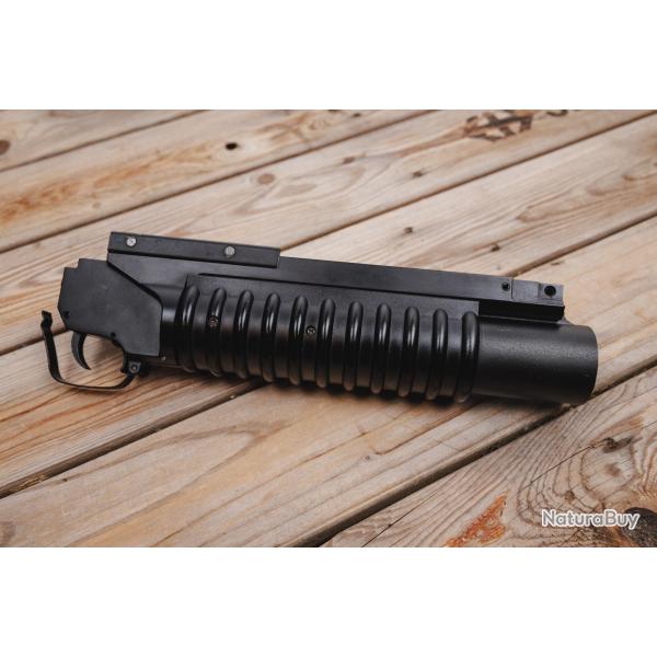 M203 Noir tat correct