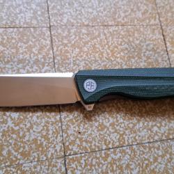 Couteau PETRIEFIED FISH PF818 flipper assisté fluide, Micarta vert