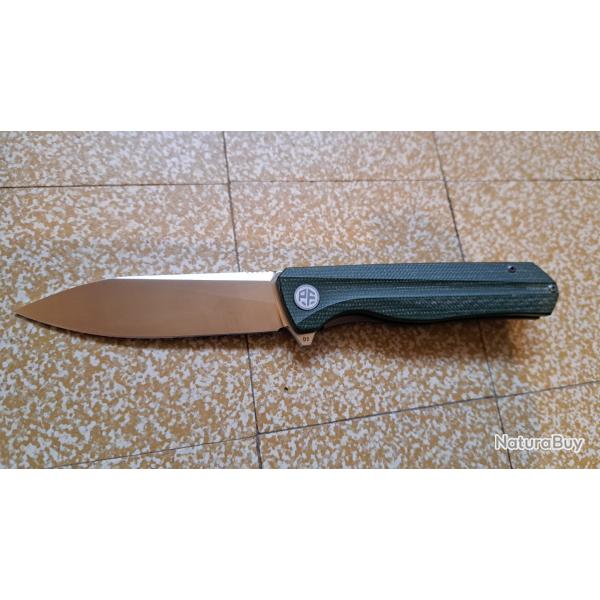 Couteau PETRIEFIED FISH PF818 flipper assist fluide, Micarta vert