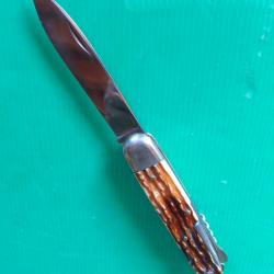 COUTEAU PLIANT MULTI FONCTIONS : A L ETOILE ,  MANUFRANCE ST ETIENNE  . AUCUN  JEU  .