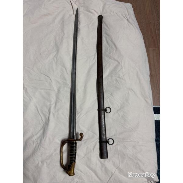 Sabre d'adjudant modle 1855/82, garde en laiton ajoure; lame  dos signe