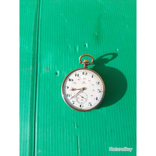 MONTRE  GOUSSET  OMEGA  .  PARFAIT FONCTIONNEMENT .