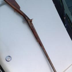 Fusil ancien joliment décoré