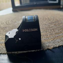 Bonjour je vends mon points rouge  holosum c510 car je n'arrive pas avec neuf  ou échange contre lun