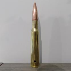 Cartouche calibre 12.7mm neutralisée par perçage.
