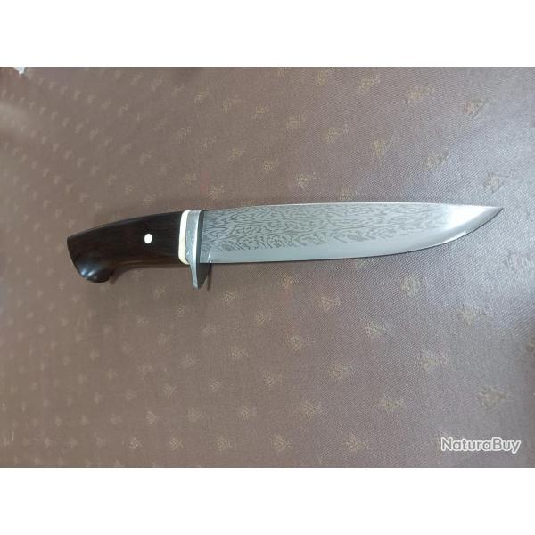 Superbe  couteau forg par Jean Paul Sire Damas barreaux , Manche phacochre  bne  du Gabon