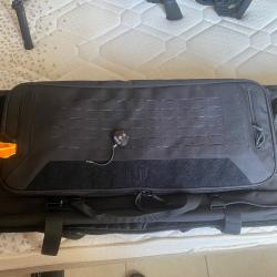 Sacoche pour deux fusils avec multiples rangement