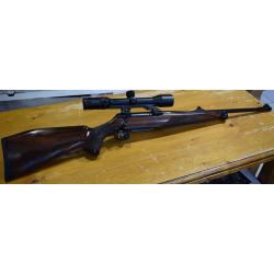 carabine a verrou Sauer 202 cal 7x64 bois canon fluté 56cm lunette swarovski 1,5-6x42 bon etat