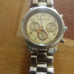 montre Michael Kors en état de marche
