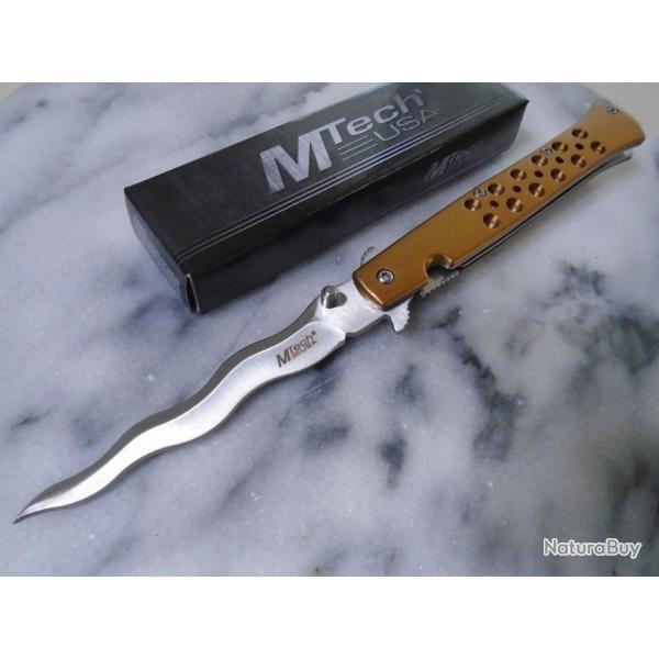 Couteau Semi Automatique MTech Kriss Lame Wavy Acier 3Cr13MoV Satin Manche Alu Anodis Or Liner Lock