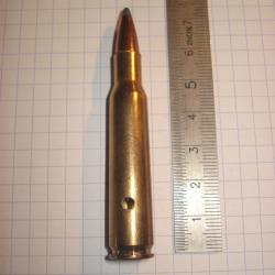 une cartouche de 7mm mauser neutralisée ogive demi blindée étui percé amorce percutée