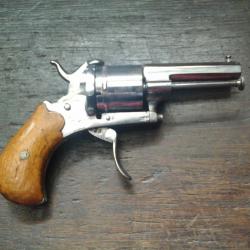 Révolver a broche.