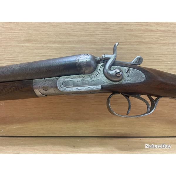 Fusil juxtaposs calibre 12 chiens extrieurs