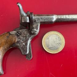 Petit pistolet dit «de cycliste» des années 1900, un coup, calibre 5,5 ou 6mm ?