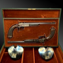 Coffret avec une PAIRE DE PISTOLETS D'ASSAUT SYSTEME DEVILLIER France XIXème siècle.