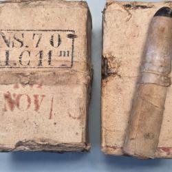Une cartouche Chassepot sortie de ce paquet complet NS .Nantes 1870