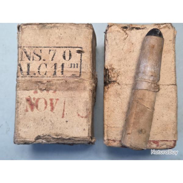 Une cartouche Chassepot sortie de ce paquet complet NS .Nantes 1870