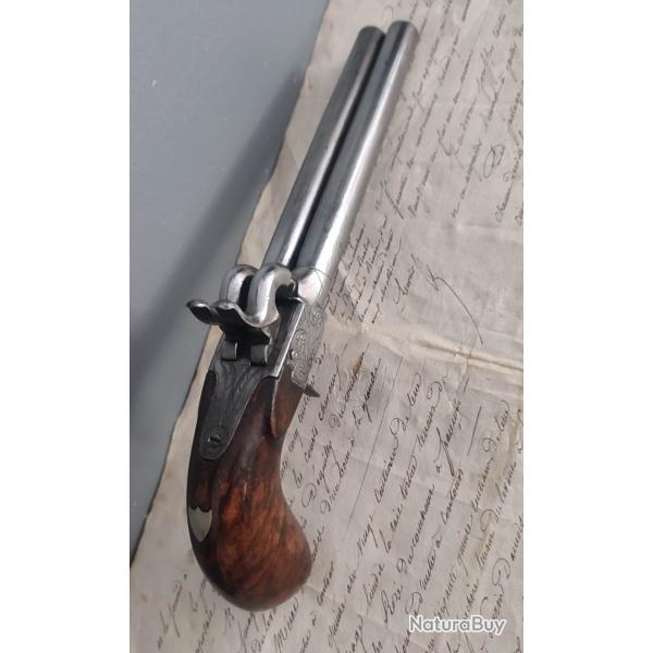 Grand pistolet juxtapos Ligois  coffre  percussion double canon trs long crosse ronce de noyer