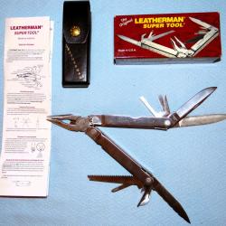 OUTIL MULTIFONCTION COUTEAUSUPER TOOL LEATHERMAN ® NEUF ÉTUI CUIR 1996 fabriqué aux USA
