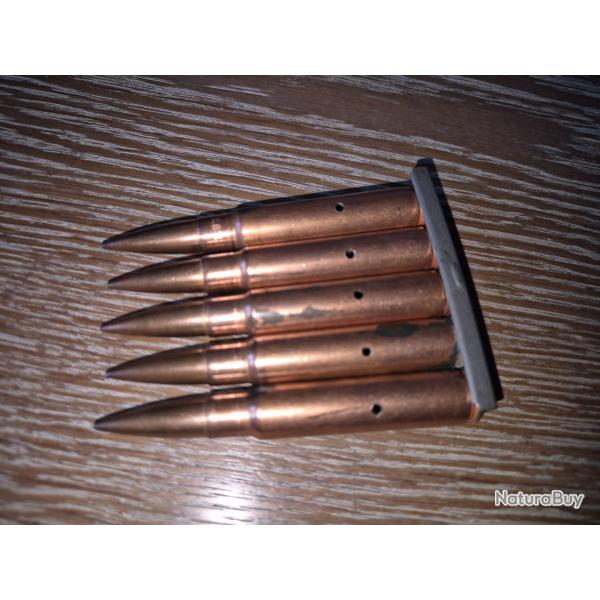 5 cartouches neutralis mauser totalement cuivr de guerre sur lame d'poque ww2