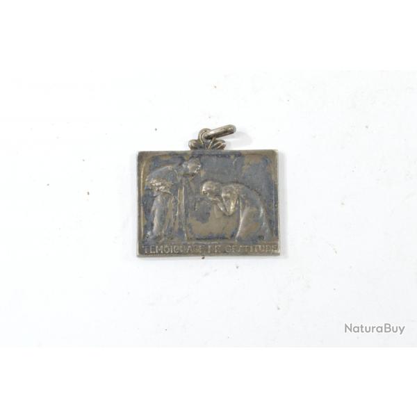 Mdaille en bronze argent signe J Marin L'oeuvre La maison des invalides. Annes 1930 - 1950