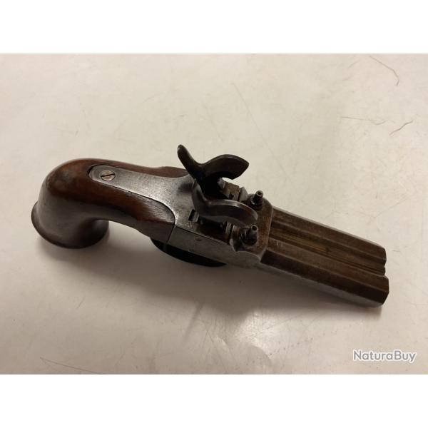 Pistolet  percussion deux canons.