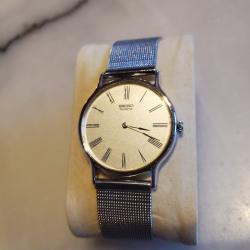 Montre Seiko quartz extra plate bracelet mailles milanaise pile neuve fonctionne parfaitement