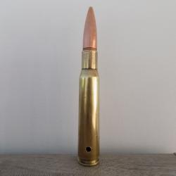 Cartouche calibre 12.7mm neutralisée par perçage.