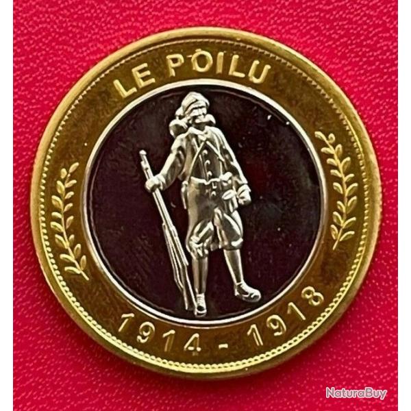 Belle mdaille ou jeton bimtallique "Le Poilu 1914-1918", "Verdun France".  Thme militaire.  18.2