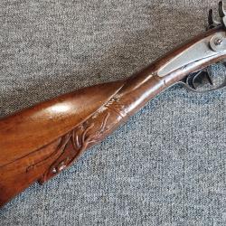 Magnifique fusil de chasse à piston calibre 16 crosse Française sculptée d'une tête de cervidé