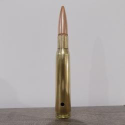 Cartouche calibre 12.7mm neutralisée par perçage.
