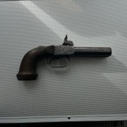 Pistolet à coffre double canon