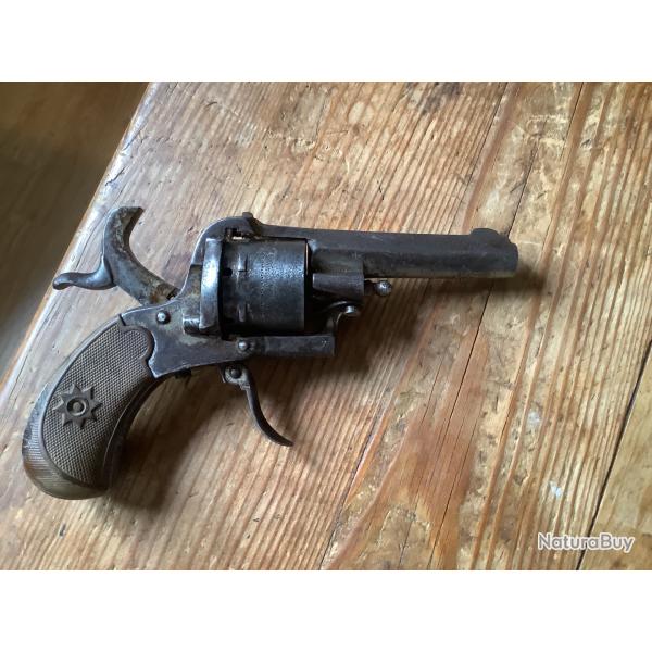 Revolver  broche carcasse ferme