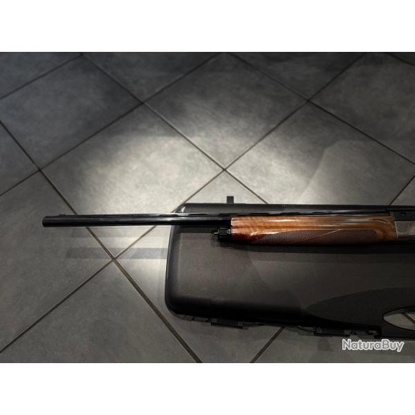 Fusil semi auto Benelli  Pasion cal 12/76. Trs belles gravures, trs beaux bois, dans sa mallette .