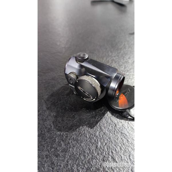 Bonjour,Je mets en vente mon Aimpoint Micro H1. Il est en parfait tat de fonctionnement.