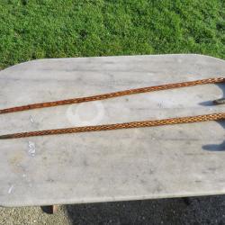 Paire d'ancienne canne de guardian en osier tressé sur tige d'acier et ligatures en fil de cuivre