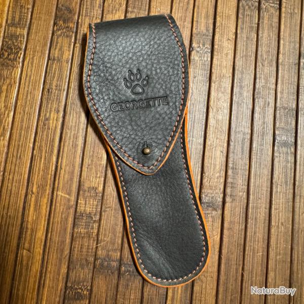 tui cuir noire aventure Georgette