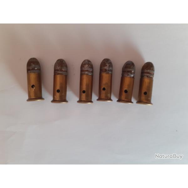 6 cartouches  320 sans poudre ,  amorces percutes , perces neutralises