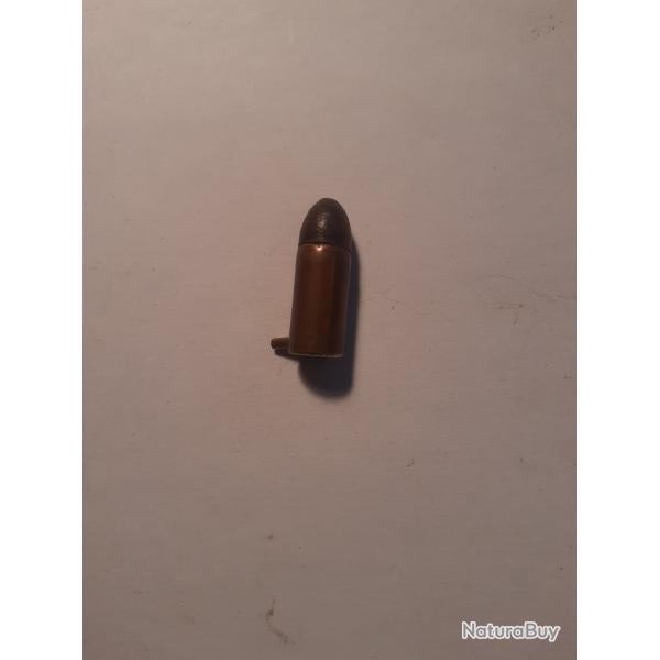 1 petite ancienne  cartouche a broche 7 mm
