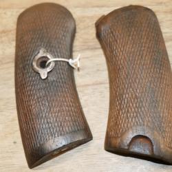 Paire de plaquettes de Revolver 1873 avec sa rosette