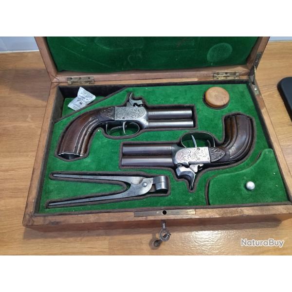 paire de pistolet  piston en coffret