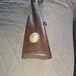 Fusil a chien côté droit avec reserve forme coquillage sur cross annèe ?