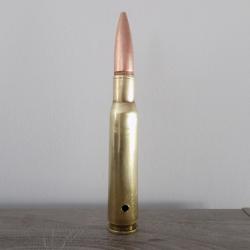 Cartouche calibre 12.7mm neutralisée par perçage.
