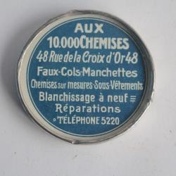 Miroir de poche publicitaire Aux 10000 chemises Genève Suisse